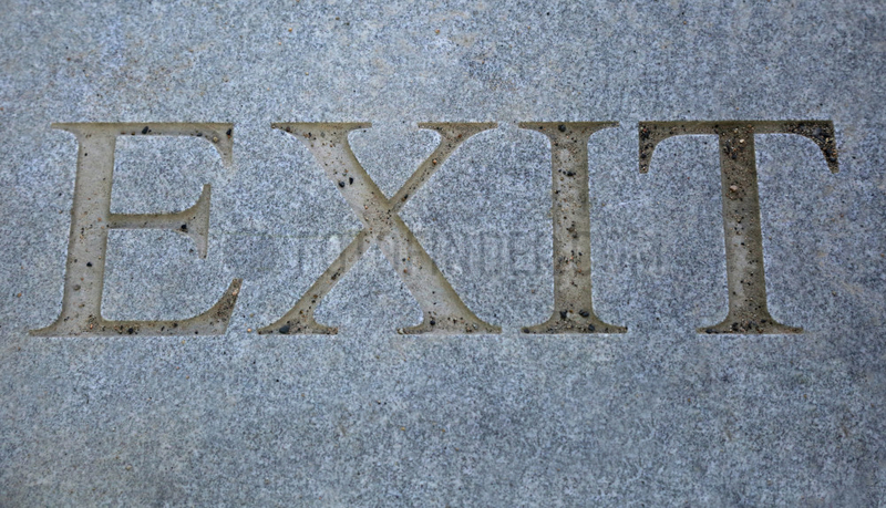 Berlin,  Deutschland,  das Wort Exit auf Granitboden eingraviert