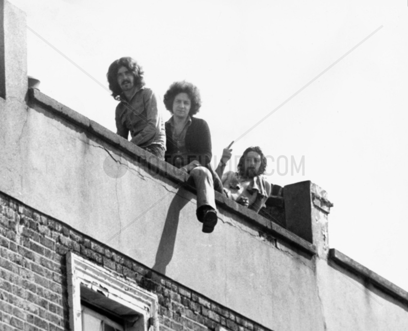 Squatters on a roof,  September 1973.