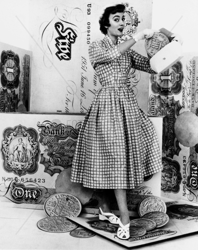 Woman with fake coins,  1950s.