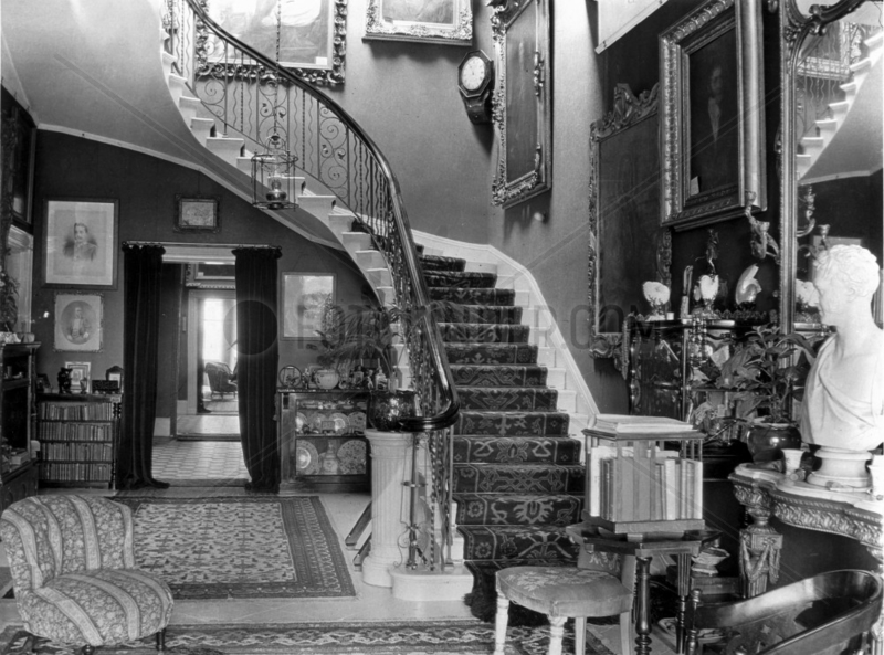 Edwardian hallway with staircase,  c 1900s.