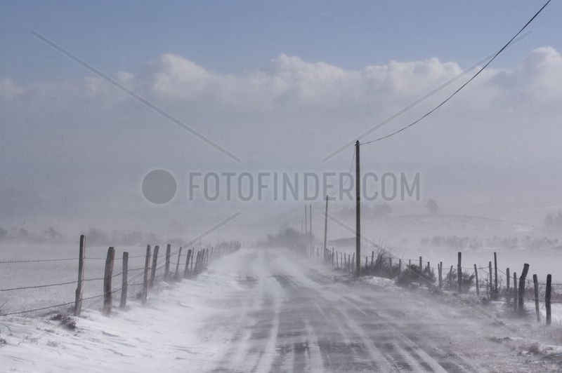 Road of Lozere under a snowstorm in winter France