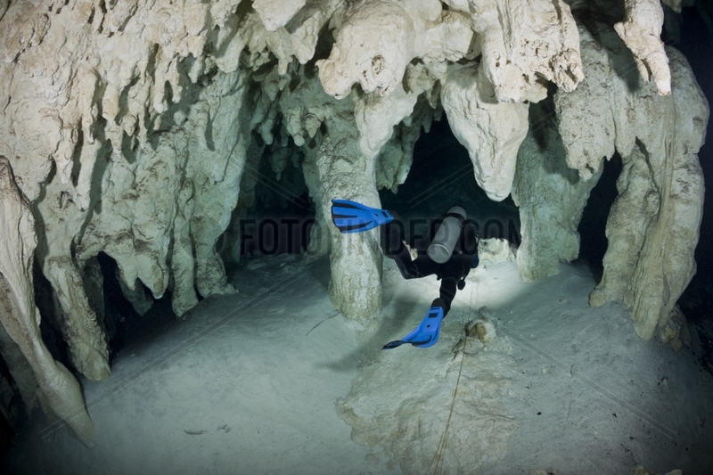 Scuba diver exploring Gran Cenote - Yucatan Mexico