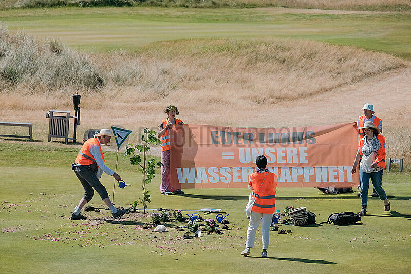 Sylt: Letzte Generation pflanzt Blumen auf Golfplatz Budersand
