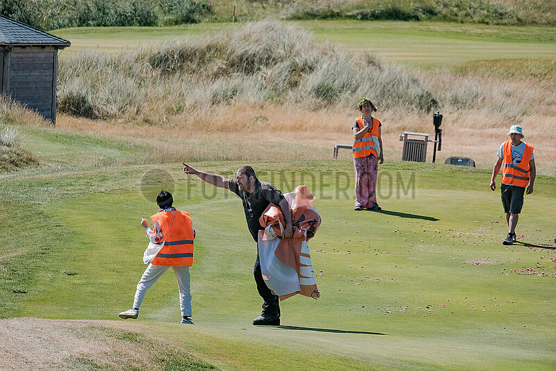 Sylt: Letzte Generation pflanzt Blumen auf Golfplatz Budersand