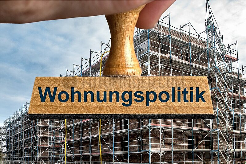 Symbolischer Stempel Wohnungspolitik