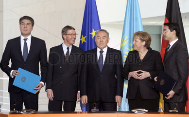 Issekeschew + Cordes + Nasarbajew + Merkel + Roesler