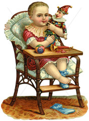 Kind im Kinderstuhl  Spielsachen  1885