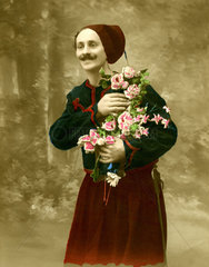 Mann mit Blumenstrauss 1920