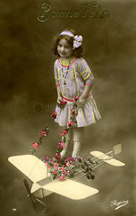 Maedchen mit Flugzeug  1910