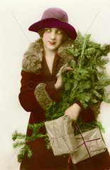junge Frau  Christbaum kaufen  um 1926