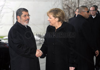 Mursi + Merkel