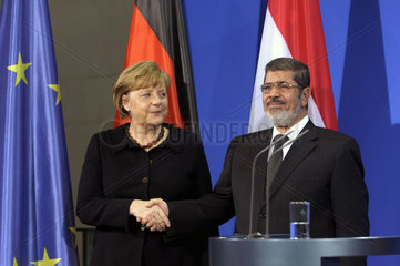 Merkel + Mursi