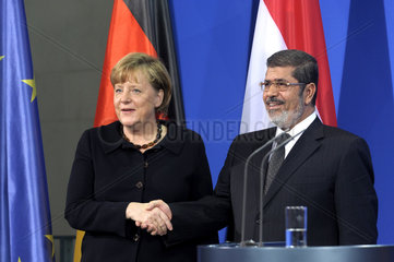 Merkel + Mursi