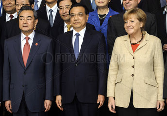 Wang Yi + Li Keqiang + Merkel