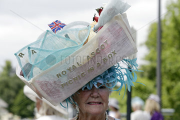 Royal Ascot  Fashion on Ladies Day  woman with a witty hat at the racecourse
