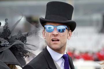 Royal Ascot  Fashion  man with top hat and sunglasses at the racecourse