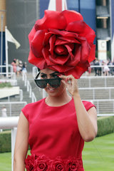 Royal Ascot  Fashion on Ladies Day  woman with a witty hat at the racecourse
