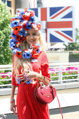 Royal Ascot  Fashion  woman with a witty hat at the racecourse