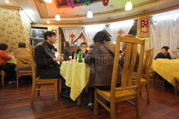Shanghai  Gaeste in einem Restaurant