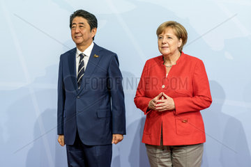 Abe + Merkel