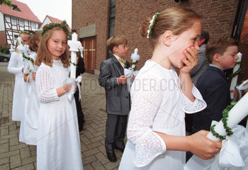 Kinder bei der Erstkommunion  Niedersachsen