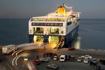Rhodos  eine Faehre der Blue Star Ferries im Hafen bei Daemmerung