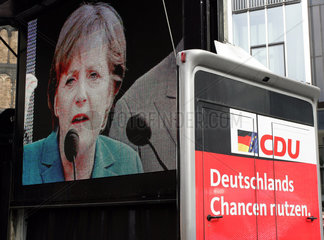 Videoleinwand mit Angela Merkel  Bundesvorsitzende der CDU