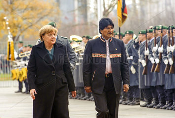 Merkel + Morales