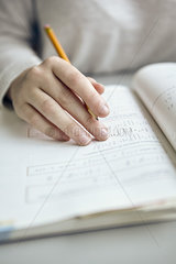 Student working on math homework  cropped