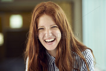 Young woman laughing  portrait