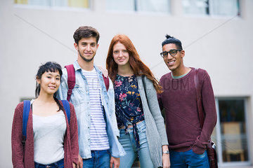 College students standing together outdoors  portrait