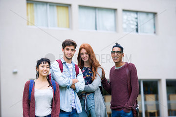 College students standing together outdoors  portrait