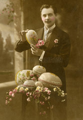 Mann mit Ostereiern  kitschig  1913