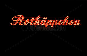 Freyburg  Deutschland  erleuchtetes Logo der Rotkaeppchen Sektkellerei
