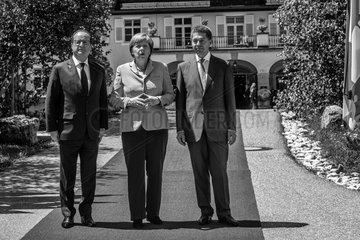 Hollande + Merkel + Sauer