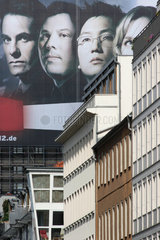 Berlin  ueberdimensionales Werbeplakat an der Fassade der Charite