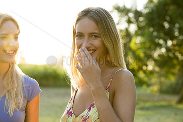 Woman having laugh with friend