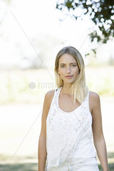Woman smiling outdoors  portrait