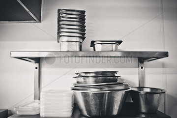 Mixing bowls stacked at kitchen prep station