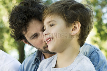Little boy with father outdoors