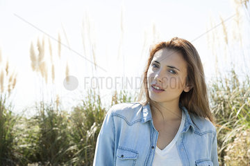 Young woman outdoors in nature  portrait