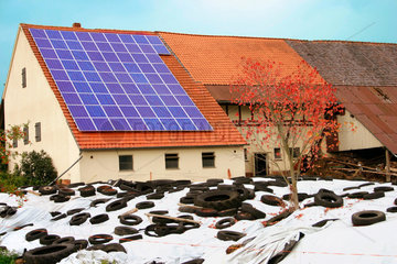 photovoltaic solar energy panels on the roof of a Farm in germany