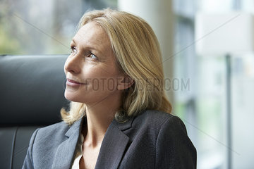 Close-up of businesswoman looking away