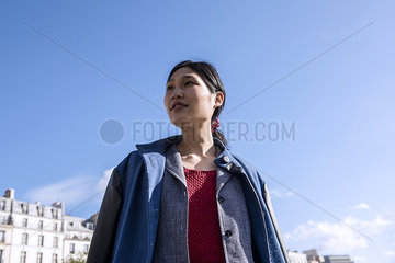 Woman standing against sky