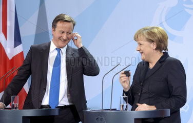 Cameron + Merkel