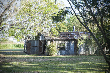 Rustic shed in rural landscape