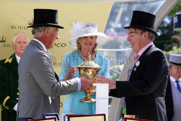 Royal Ascot  Prince Charles (left) gives the trophy to owner Sir Andrew Lloyd Webber after The Fugue with William Buick won the Prince of Wales's Stakes