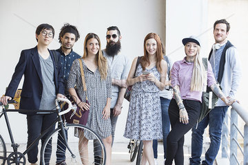 Group of hipsters standing together outdoors