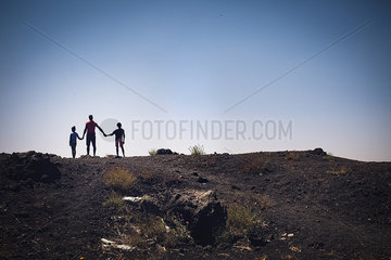 Family with two children enjoying natural splendor