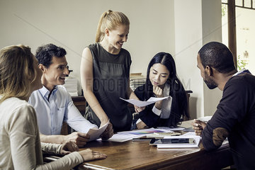 Colleagues meeting in casual office